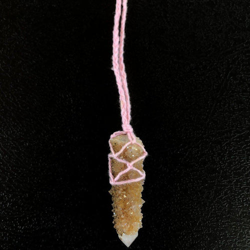 Spirit Quartz Crystal from South Africa, wrapped in macramé style wool yarn.