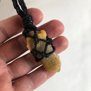 Spirit Quartz Crystal from South Africa, wrapped in black macramé style string